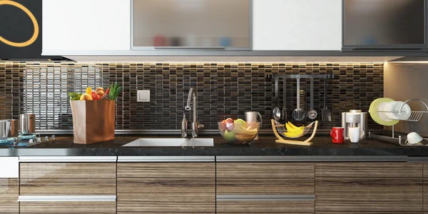 A kitchen with a sink and counter top