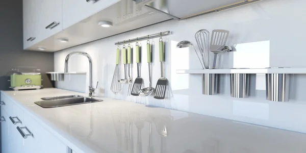 A kitchen with many utensils hanging on the wall.